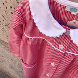 Grembiule LAB vichy rosso e bianco rifinito con serpentina