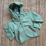 Felpa verde con cappuccio fantasia ghiande 25BABJAGR