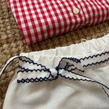 Shorts bianco con orlo profilo blu centinato e cinturino con fiocco La Mascot 55/2501377