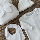 Tutina in ciniglia avorio con farfalla BT53GL BabyGi