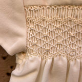Pagliaccetto battesimale newborn in flanella burro ricamo punto smock F25I134TUNN