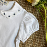Polo colletto petalo con ricamo fiori blu Malvi & Co S26M022CAJJ