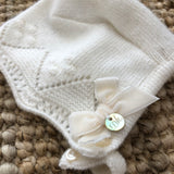 Milk-worked newborn bonnet DK124