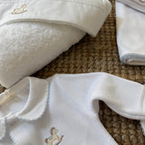 Tutina in ciniglia con cavallino a dondolo azzurro RH53G BabyGi