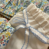 Shorts bianco con orlo profilo azzurro centinato e cinturino con fiocco La Mascot 55/2501377