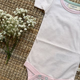 Body mezza manica fiorellini base rosa Pigeon 26SUMBA