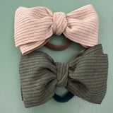 LAB headband covered in velvet with semi-rigid bow in matching tones