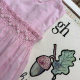 Abito rosa in voile con ricamo smock Malvi & Co S26M004VEZV