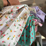 Borsa cartella media con tracolla bianco con fiorellini colorati Naj-Oleari