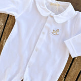 Tutina in ciniglia bianco con profilo e cavallino a dondolo ricamato azzurro RH53B