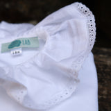 Polo LAB bianco con colletto frill profilato in sangallo