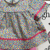 Camicetta Deva LAB fantasia fiorellini multicolor con serpentina fucsia