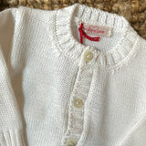 Cardigan girocollo latte in cotone organico