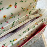 Borsa cartella media con tracolla bianco con fiorellini colorati Naj-Oleari