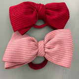 LAB headband covered in velvet with semi-rigid bow in matching tones