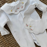 Tutina in ciniglia bianco collo petalo in piquet ricamato PQ50 BabyGi