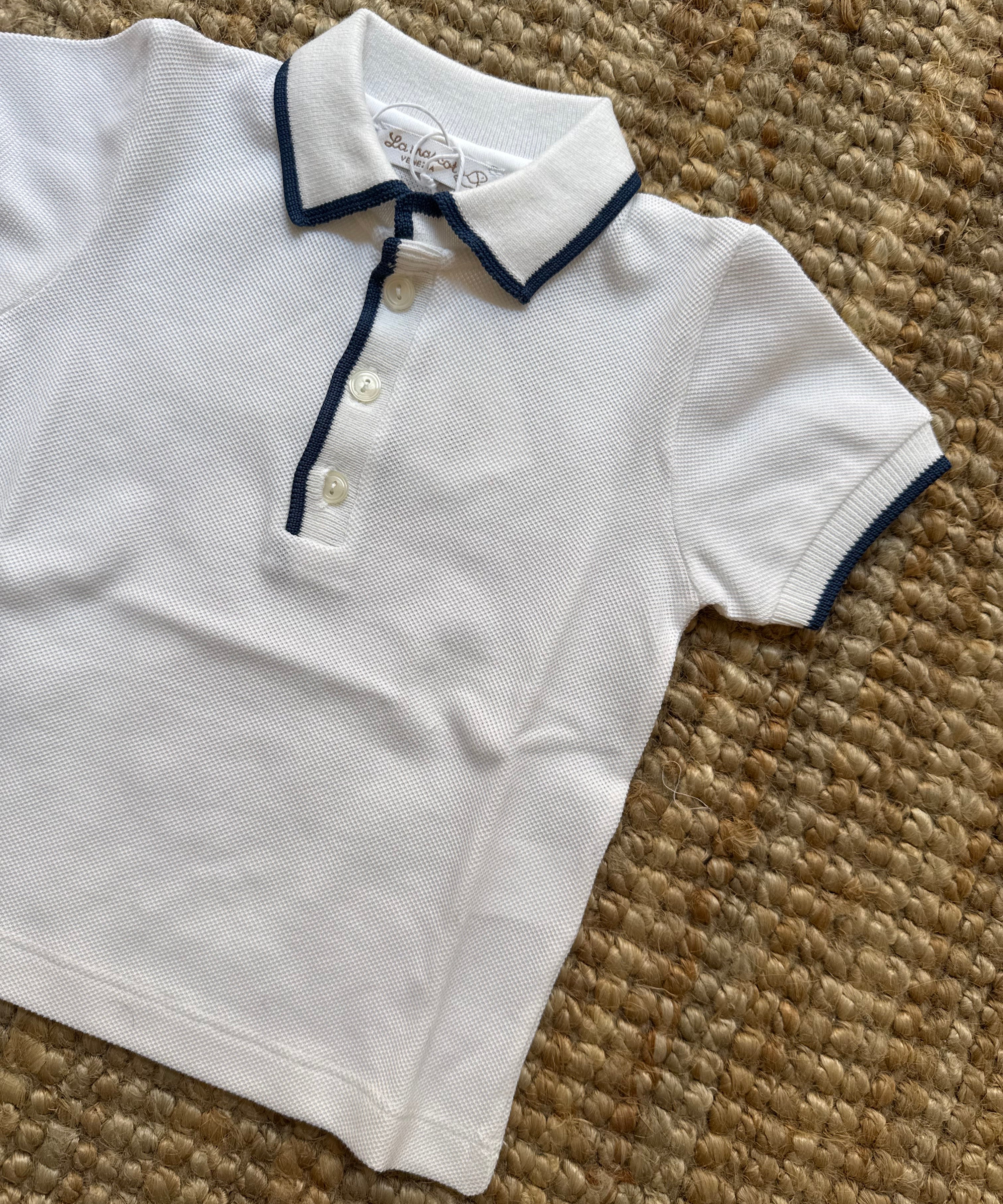 Polo in piquè bianco profilata dettagli blu La Mascot 55/1208012