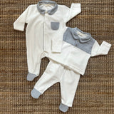 Tutina in ciniglia latte con dettaglio spigato polvere WY53B