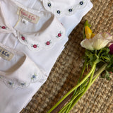 Polo colletto petalo con ricamo fiori celeste Malvi & Co S26M022CAJJ
