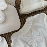 Tutina in ciniglia avorio con farfalla BT53GL BabyGi