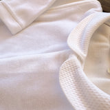 Tutina in ciniglia bianco con colletto rotondo BG530