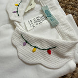 Polo LAB colletto petalo e ricamo luci natalizie