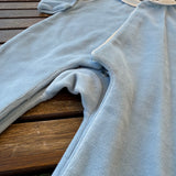 Tutina in ciniglia azzurro con colletto rotondo BG530