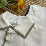 Polo in piquè bianco profilata dettagli verde La Mascot 55/1208012