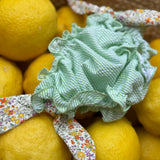 Costume LAB slip in cotone righina verde e bianco con fiocchi nodo fiorellini colorati