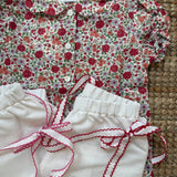 Shorts bianco con orlo profilo rosa centinato e cinturino con fiocco La Mascot 55/2501377