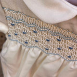 Pagliaccetto battesimale newborn in flanella burro ricamo punto smock azzurro F25I134TUNN