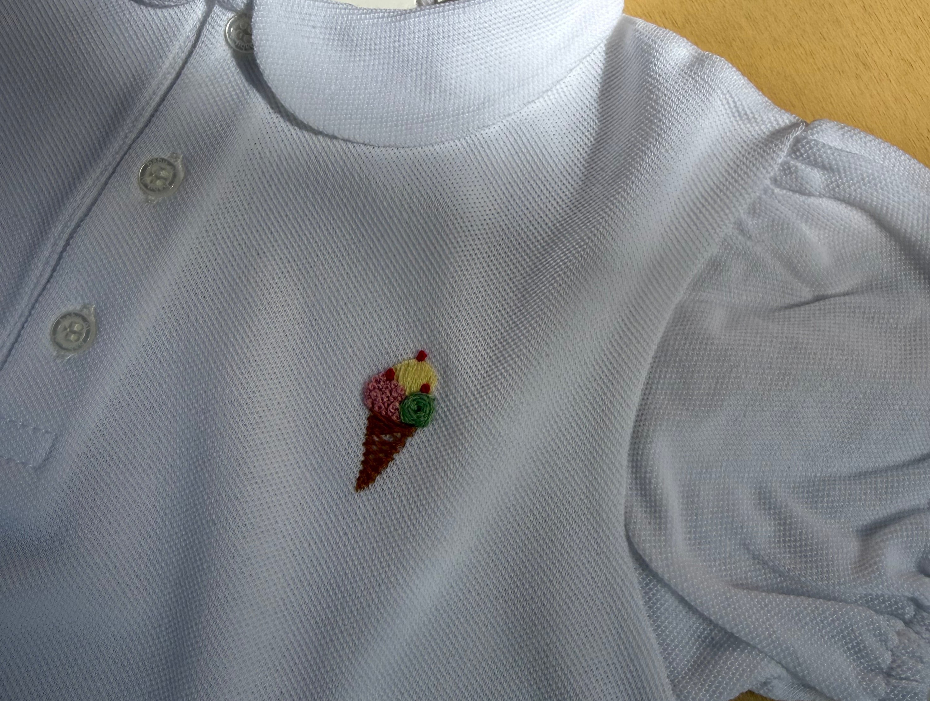 Polo colletto rotondo bianco in piquet ricamata a mano Baby Gi PL173GMC