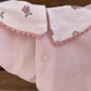 Tutina newborn ciniglia rosa con colletto fiori ricamati art OI2406301