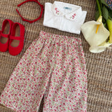Polo LAB Claudia bianco con collo petalo piquet ricamato fiori rosa